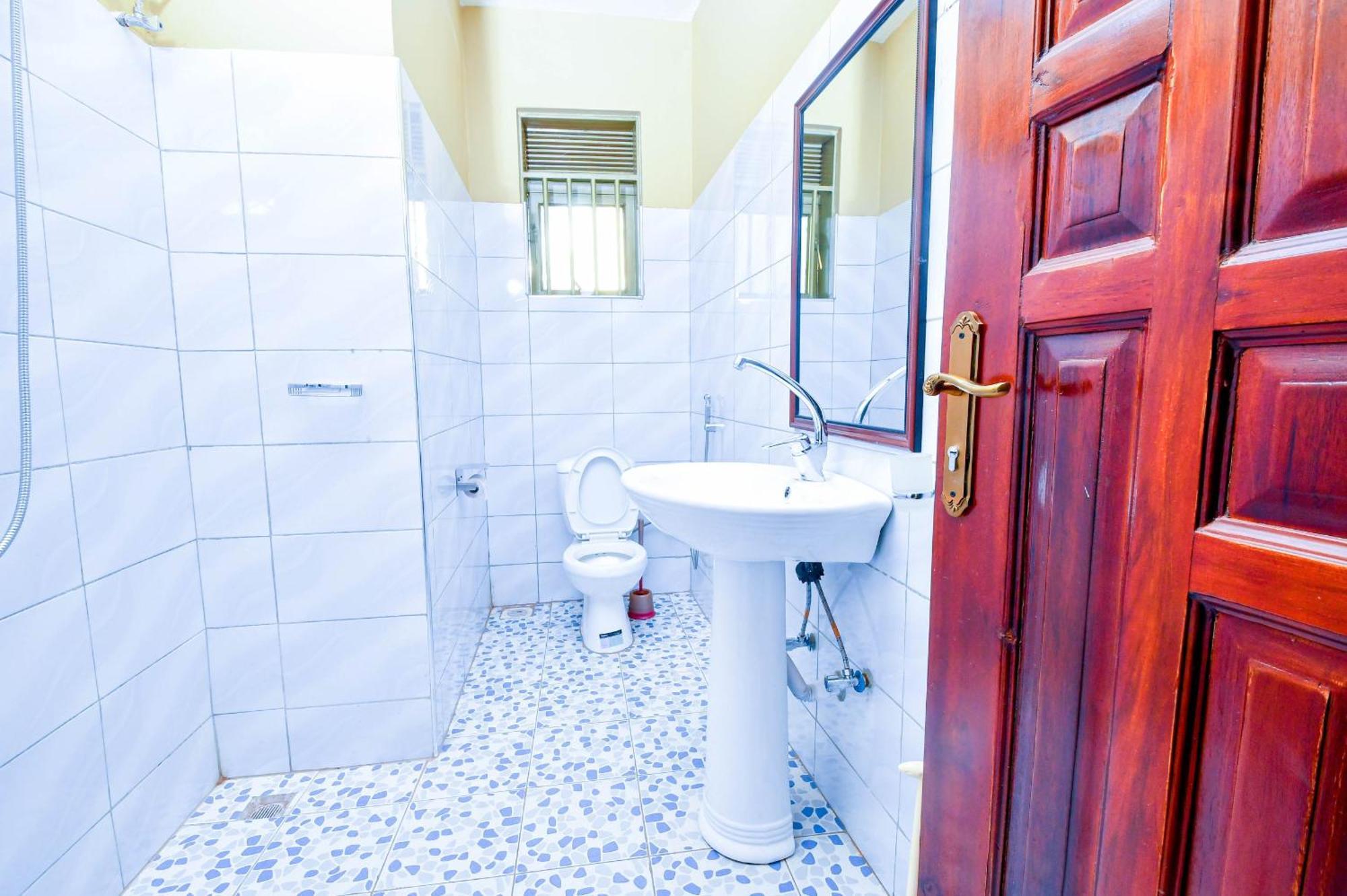 Peace Of Mind Suites Entebbe Buitenkant foto
