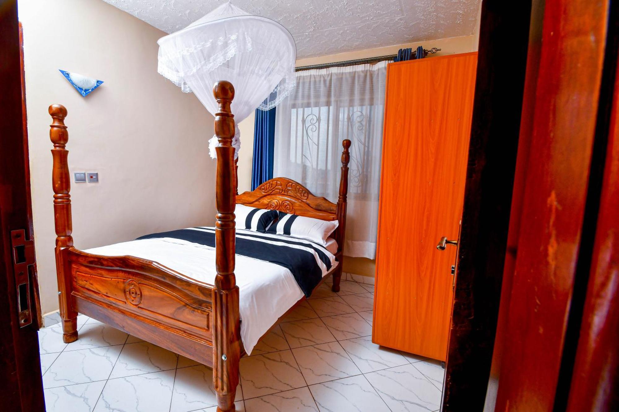 Peace Of Mind Suites Entebbe Buitenkant foto